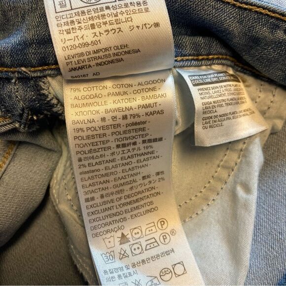 Levi’s Classic Mid Rise Skinny Jeans Size 32 Metallic Sides Light Wash - Picture 7 of 8